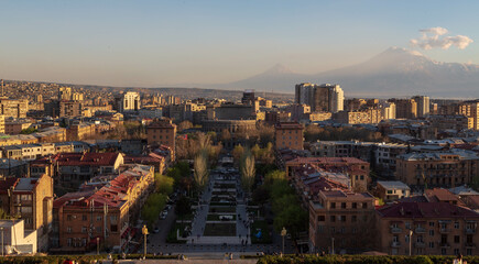 Fototapeta na wymiar Mount Ararat and Yerevan viewed from Cascade at sunset, Yerevan, Armenia, Middle East, Asia