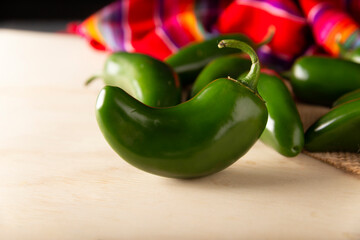 Serrano Chile or Green Chile. (Capsicum annum). Very popular variety of hot chili in Mexican cuisine, it is commonly consumed fresh in a wide variety of sauces and dishes.