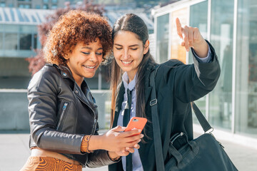 girls on the street helping to find the address