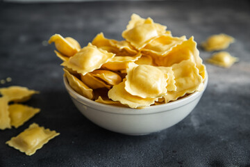 ravioli pasta stuffed square shape italian dish fresh healthy meal food snack diet on the table copy space food background rustic top view