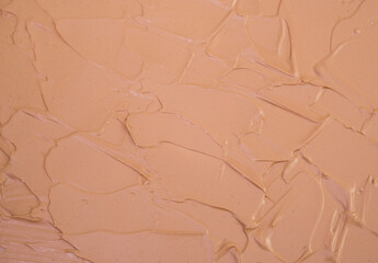 Makeup base cream blur, red clay mask texture. Background