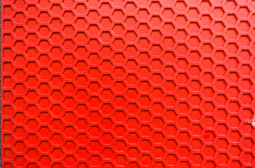 close up of hexagon shapes red colour background from above