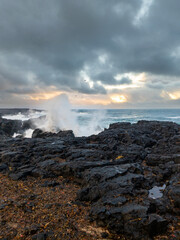 Ocean waves breaking on the gap between continental plates in western Iceland