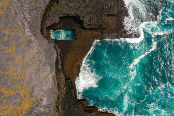 Aerial view on Poll na bPéist Wormhole, Inishmore, Aran Island. Ireland. Famous and popular...