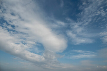 Naklejka na ściany i meble Blue cloudy sky. Nature background. Design backdrop