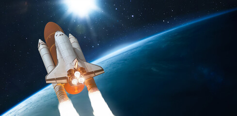 Space shuttle on orbit of Earth planet. View from outer space. Spaceship flight. Launch and...