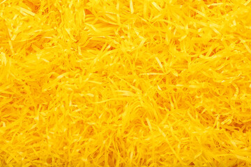 Obraz premium Heap of yellow shredded paper as background