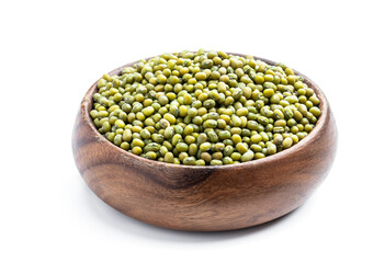 Raw green mung beans in wooden bowl isolated on white