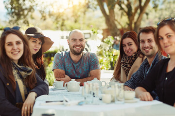 Getting together for lunch. Shot of a group of friends having lunch together.