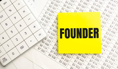 A man in a white shirt holds a piece of paper with the text: founder.
