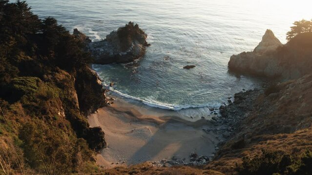 Big Sur California drone shot waves crashing mcway waterfall 