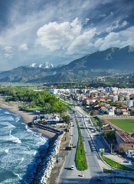 view of the city of aokas bejaia algeria, sea snow mountain trees