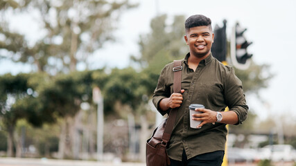 Whatever your pursuit, pursue it with purpose. Shot of a confident young businessman walking through the city.