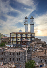 Fototapeta premium mosuqe above an ancient town with sunset