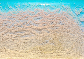 Imitation of the beach, sand and sea. Texture relief background.