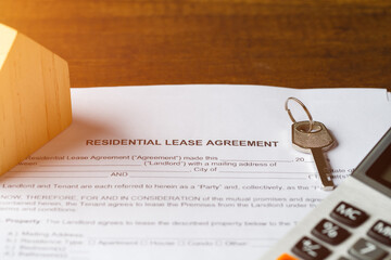 Residential lease agreement document concept. Lease agreement document with keys and house, house ,...