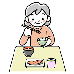 食事をするシニア女性