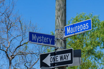 Street Signs at the Corner of Mystery Street and Maurepas Street in New Orleans, LA, USA