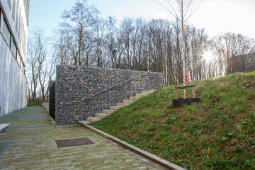 Fence of stones in an iron cage