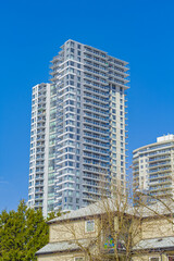 Facade detail of a modern high-rise apartment building. Abstract Architectural Detail of a High Rise Condo Building