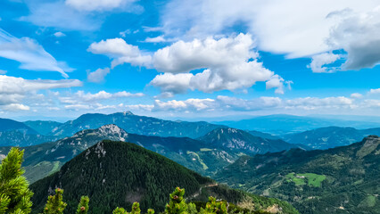 Panoramic view on the mountain peaks of Karawanks and Kamnik Savinja Alps in Carinthia, border...