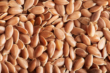 Flax seeds close-up. Macro photo. View from above. Flat lay.