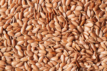 Flax seeds close-up. Macro photo. View from above. Flat lay.