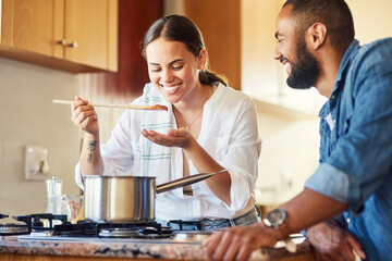 Lets see how good your cooking is. Shot of a couple cooking together at home.