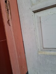 Image of white orange and red wooden door border