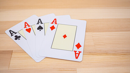 Playing cards lined up on the desk_19