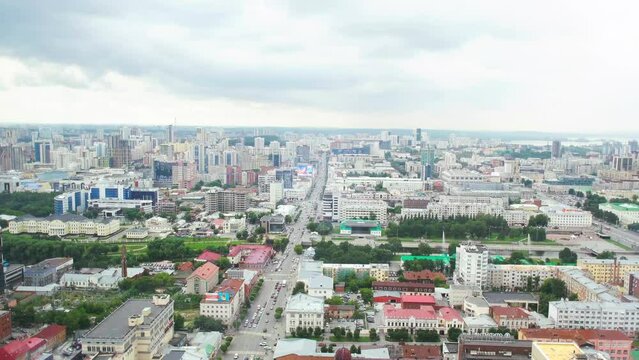 Aerial view of city traffic in center in the morning. Media. Car traffic on streets birds eye view. View from above with angle