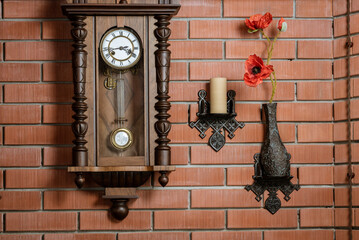 Vintage wall clock on a brick wall