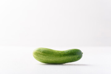 Fresh cucumber on white background