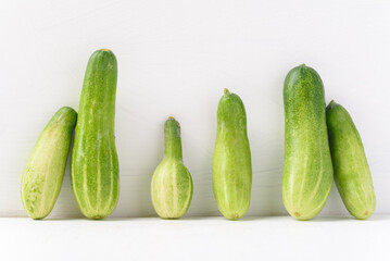 Fresh cucumber on white background