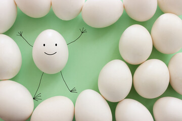 Eggs with funny faces drawn