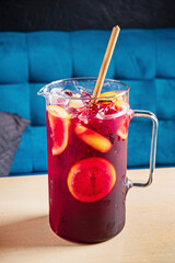 cold sangria with fresh fruits and berries