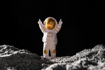 Spaceman stand on surface of alien planet.