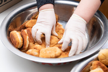 cooking fried pies with potatoes and cabbage in the dining room kitchen