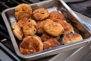 cooking fried pies with potatoes and cabbage in the dining room kitchen