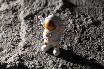 Spaceman on surface of rocks.  Astronaut