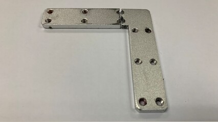 Silver Colour L Plate bracket is damaged.