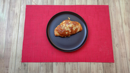 Photo of Croissant on black dish