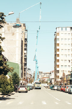 Construction of a residential building. Crane working on the top of a building . Batumi, Georgia- March 2022. 