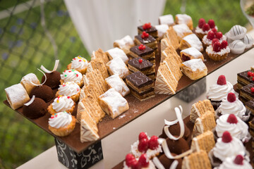 candy bar for a wedding holiday many different cakes cream chocolate