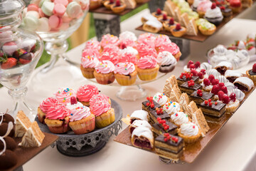 candy bar for a wedding holiday many different cakes cream chocolate