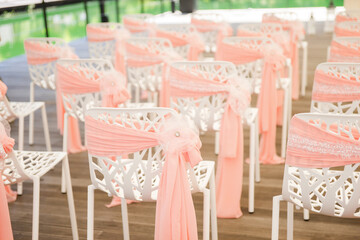 wedding ceremony under a canopy outdoors