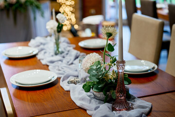 floristic arrangements on the wedding table close-up flowers
