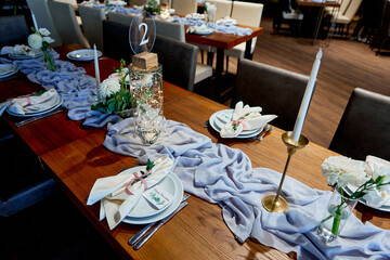 napkins on the table with a seating card restaurant wedding decor