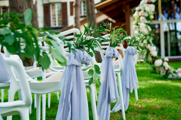 wedding ceremony in nature round arch of natural flowers