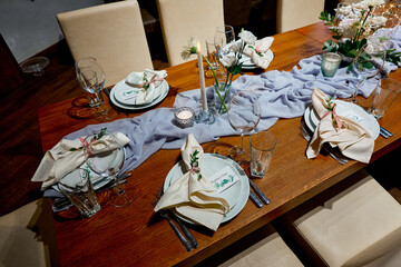napkins on the table with a seating card restaurant wedding decor